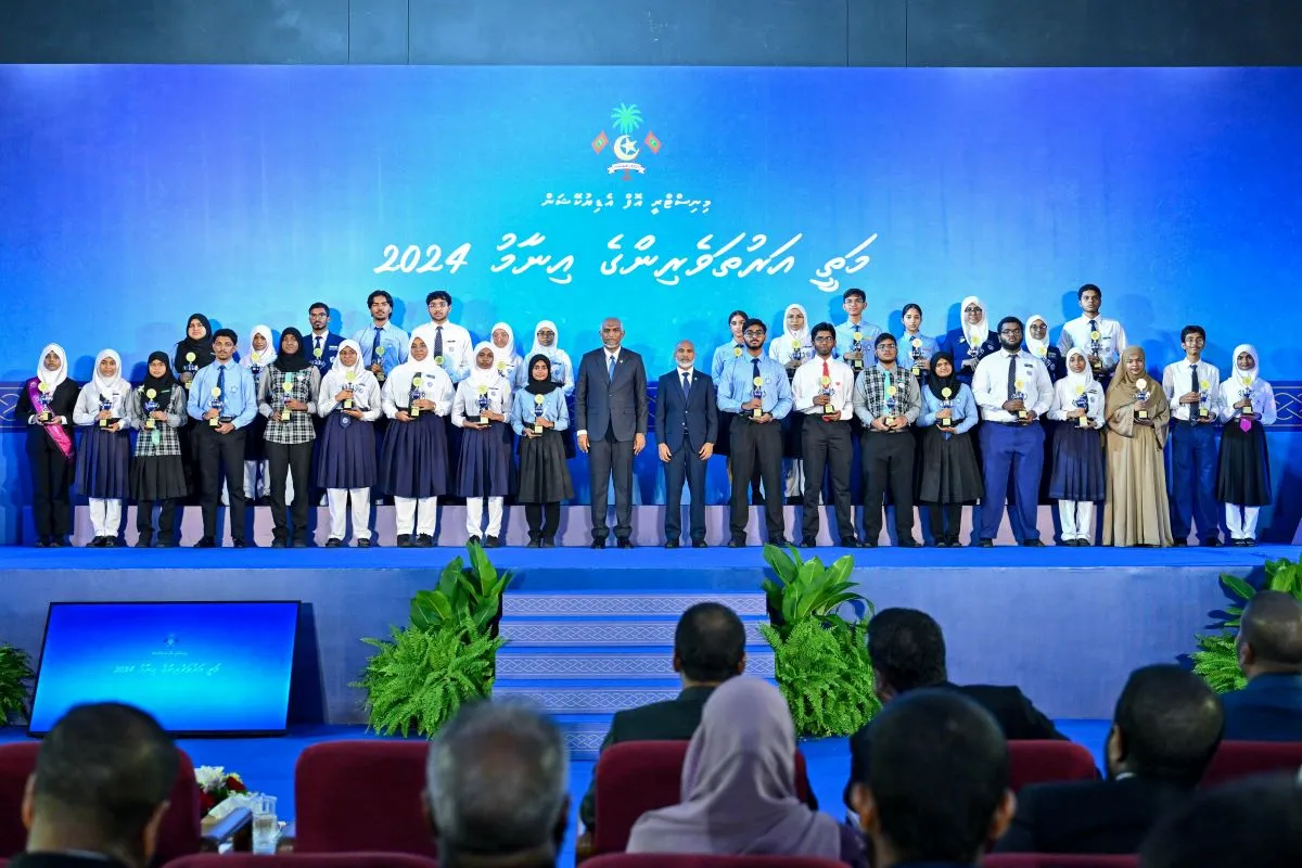 President Dr. Muizzu and Education Minister Dr. Ismail Shafeeu along with award winners at High Achiever's awards ceremony held tonight (Photo/President's Office)