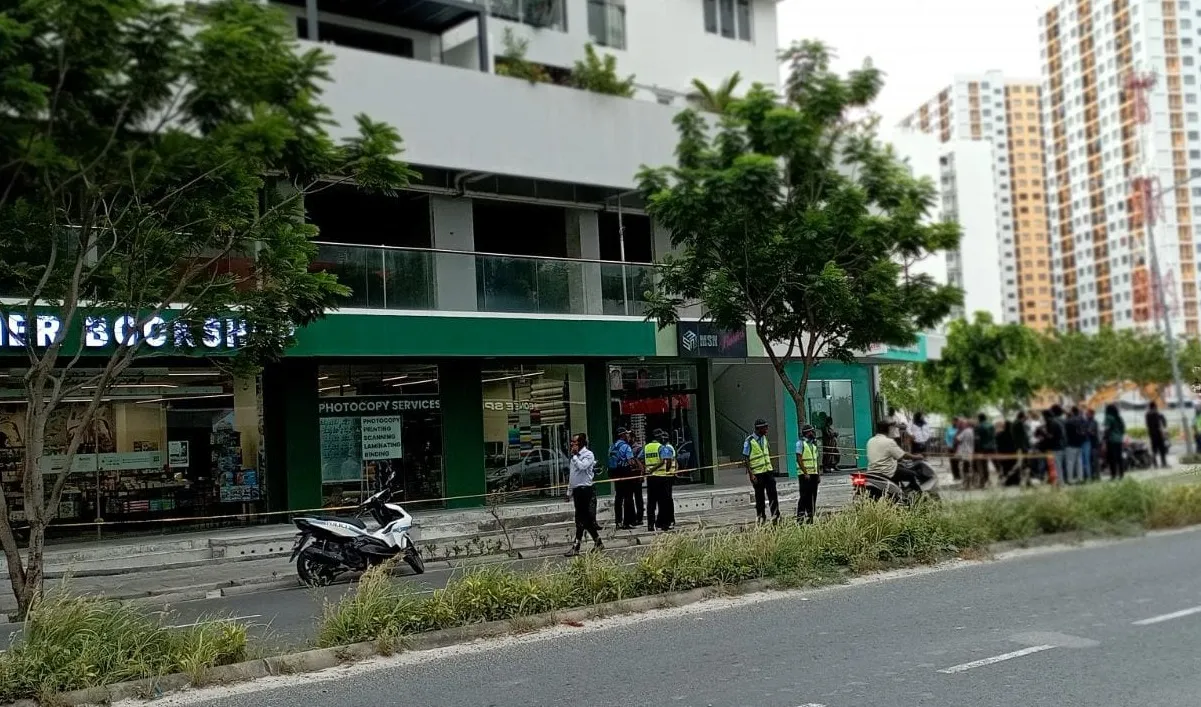 Police at the scene of the fall
