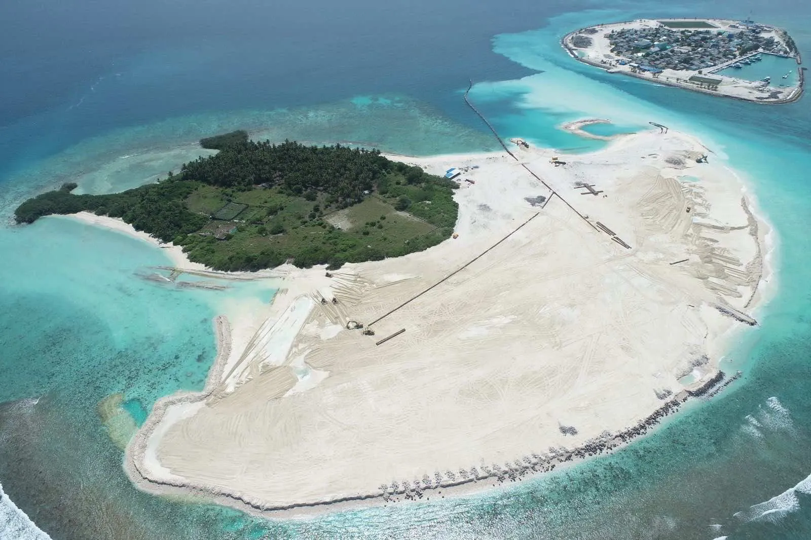 ދެކޮމަންޑޫ ގުޅުވައިލުމަށް ބޭނުންވާ ބިން ހިއްކައި ނިންމައިލައިފި