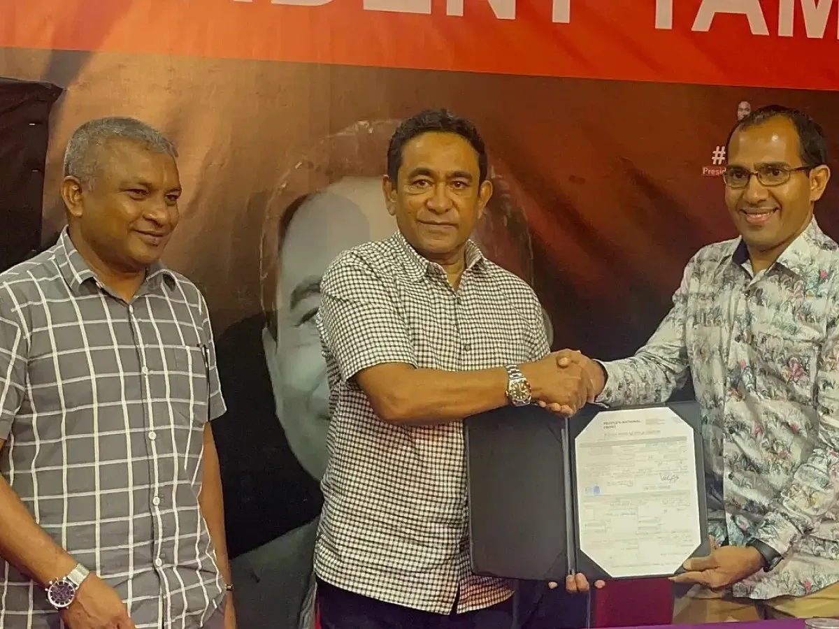 ރަޢިސް ޔާމީން ޕީއެންއެފް އަށް ސޮއިކުރެއްވުން / ފޮޓޯ:ޕީއެންއެފް