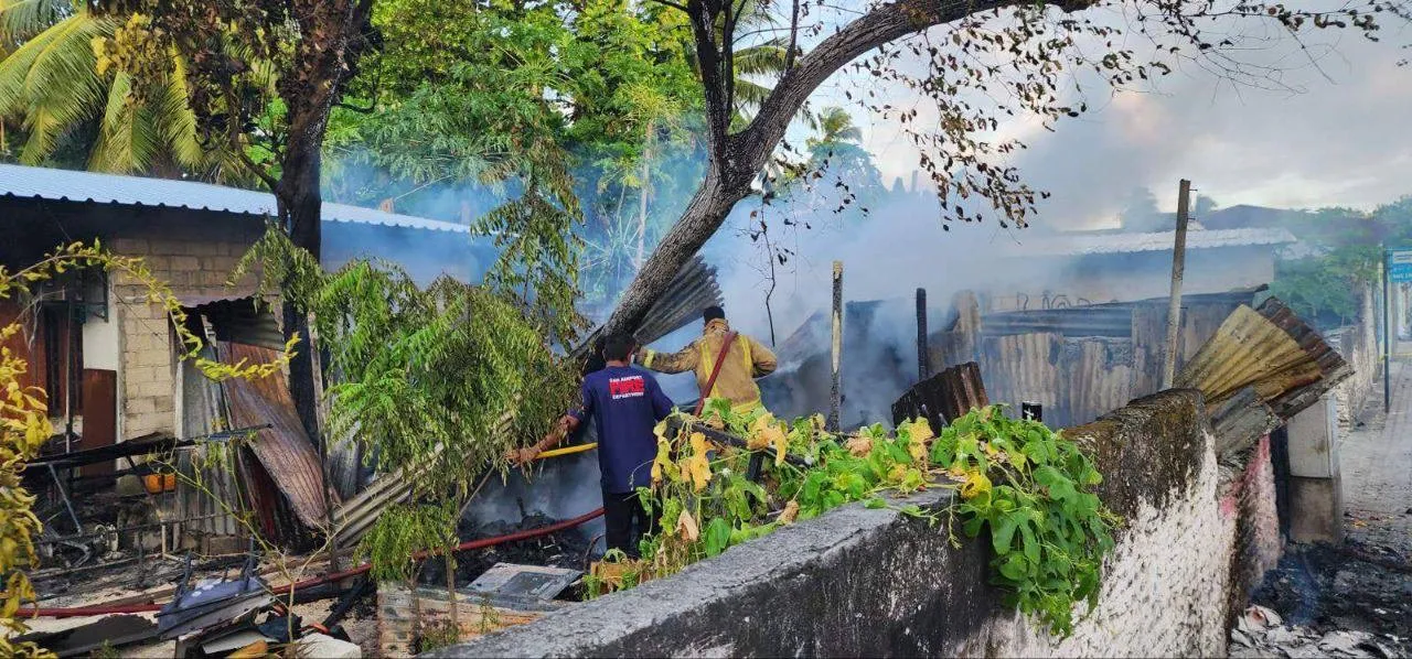 Image showing significant damage to the warehouse after fire fighters brought the fire under control (Photo/MNDF)