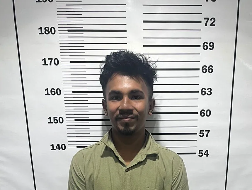 Bangladeshi expat who was handed over to Police for littering Male' City streets (Photo/ Male' City Council)