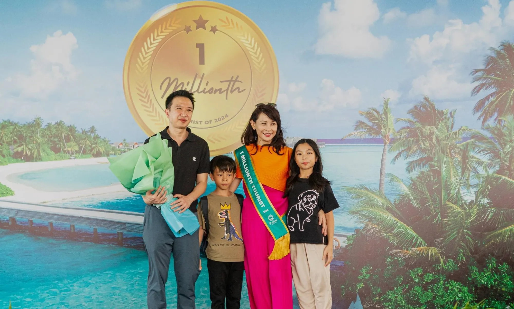 One millionth tourist of 2024 and her family