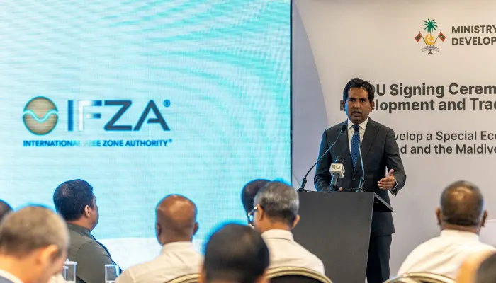 Economic Minister Mohamed Saeed speaking at today's MoU signing ceremony