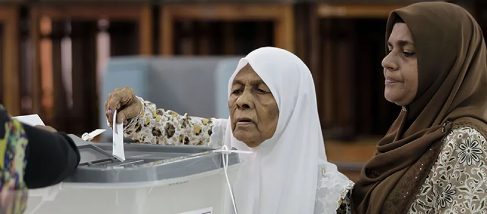 A woman casting her vote (Photo/IFES)
