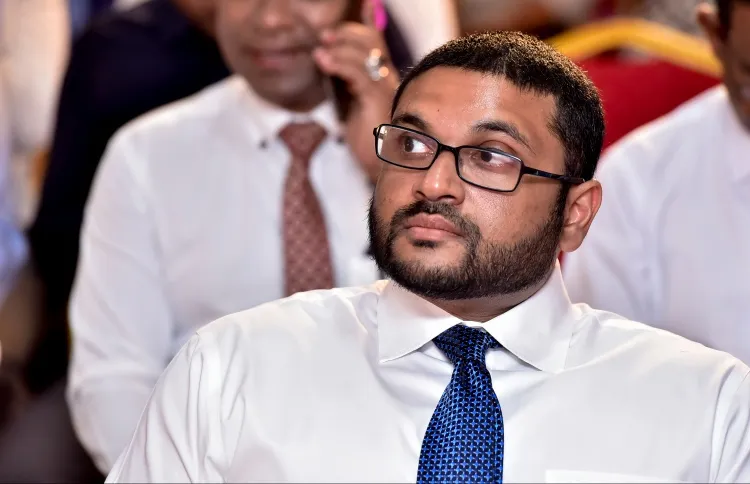 Defense Minister Ghassan Maumoon