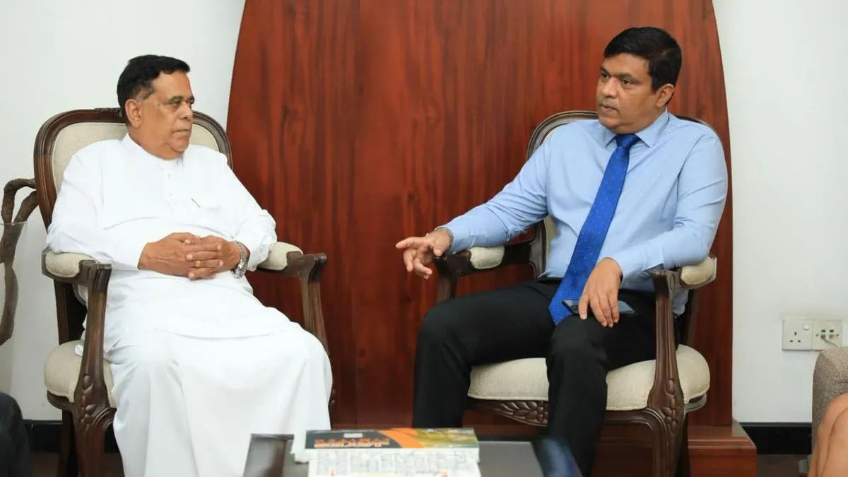 Minister of Ports, Shipping, and Aviation for Sri Lanka, Nimal Siripala de Silva (on the left), and Minister of Transport and Aviation Services for Maldives, Mohamed Ameen (on the right).