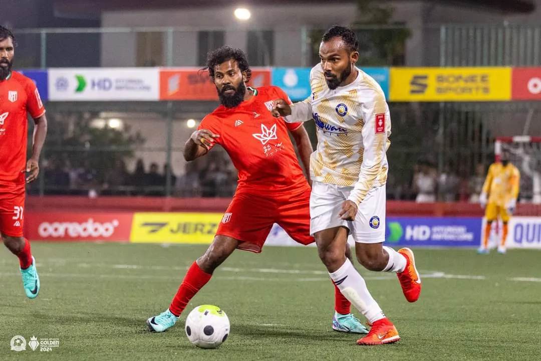 ކެލައާއި ބާރަށް ވާދަކުރި މެޗުގެ ތެރެއިިން... ފޮޓޯ: ގޯލްޑަން ފުޓްސަލް އެސޯސިއޭޝަން