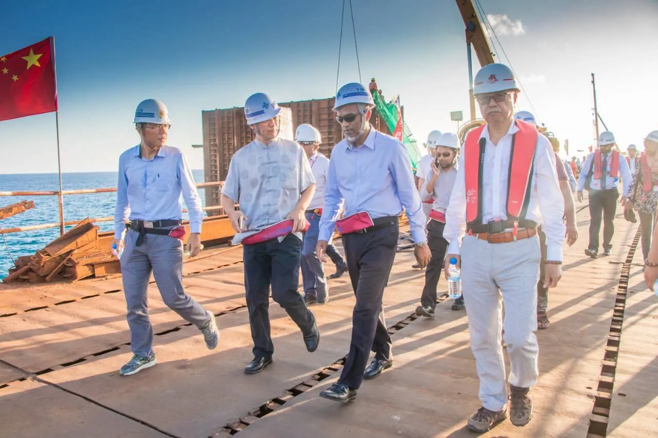 President Dr.  Muizzu on a site visit with former ambassador (Photo/Facebook)