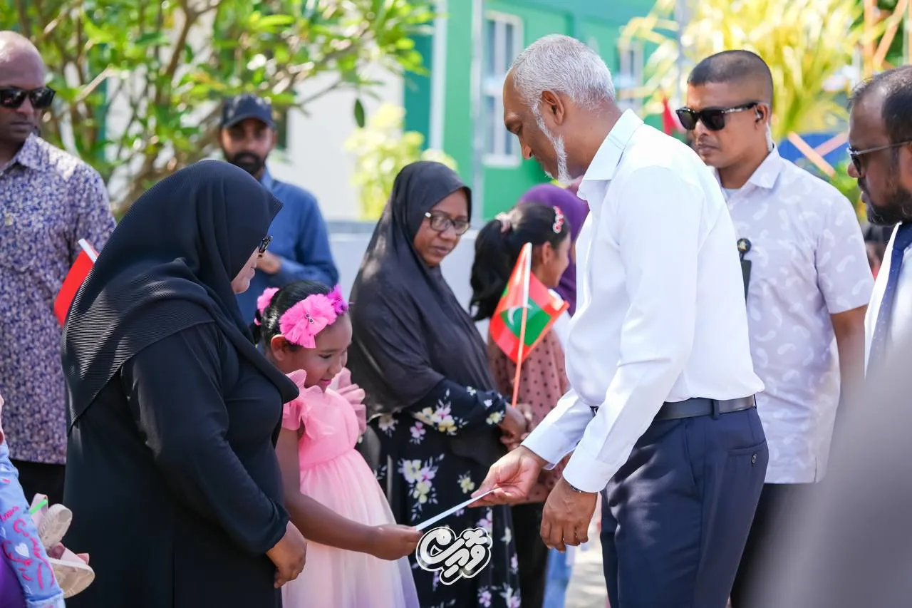 President Dr. Muizzu greeting the residents (Photo/President's Office)