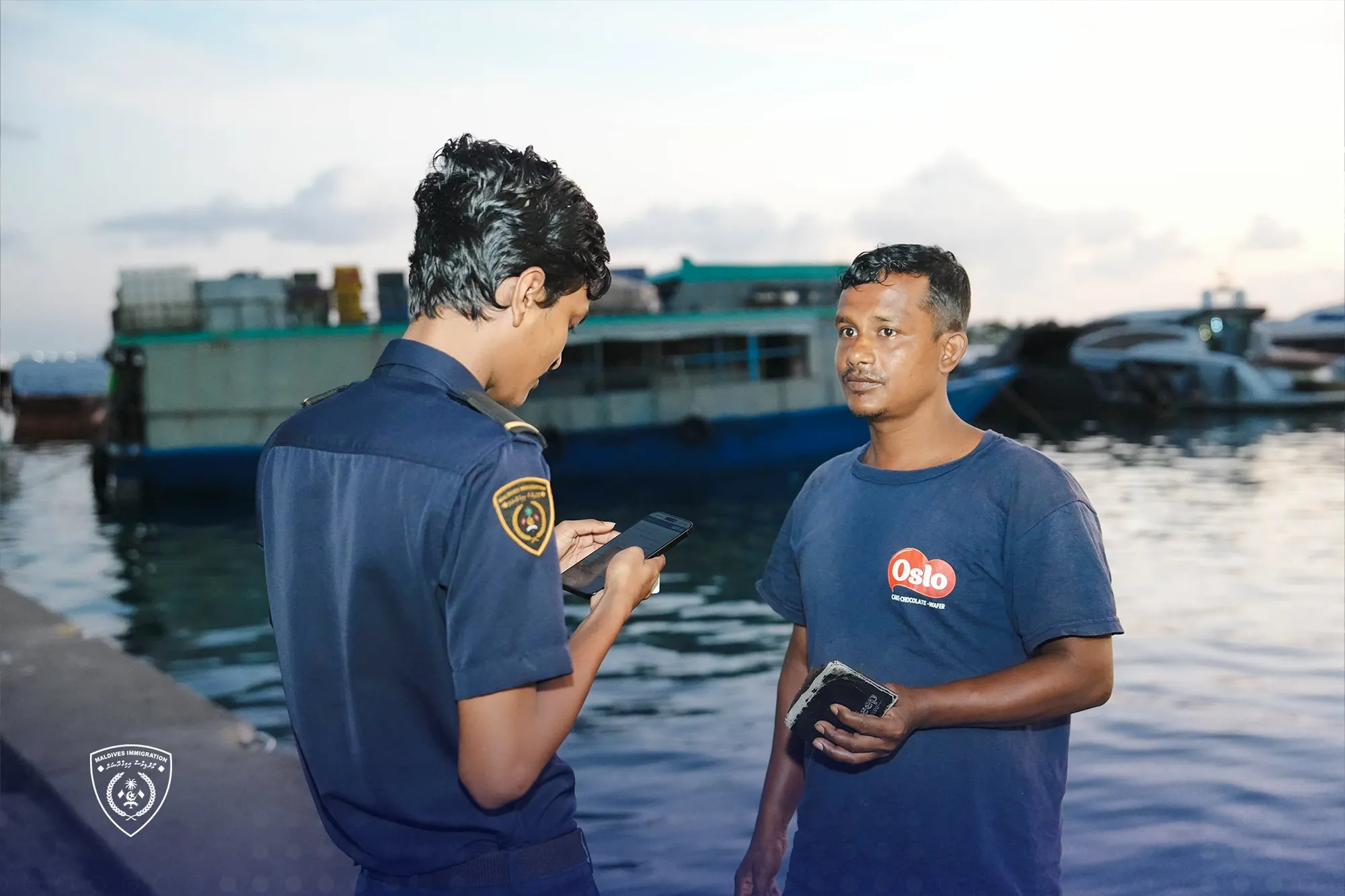 Immigration officer during  a raid (Photo/Immigration)