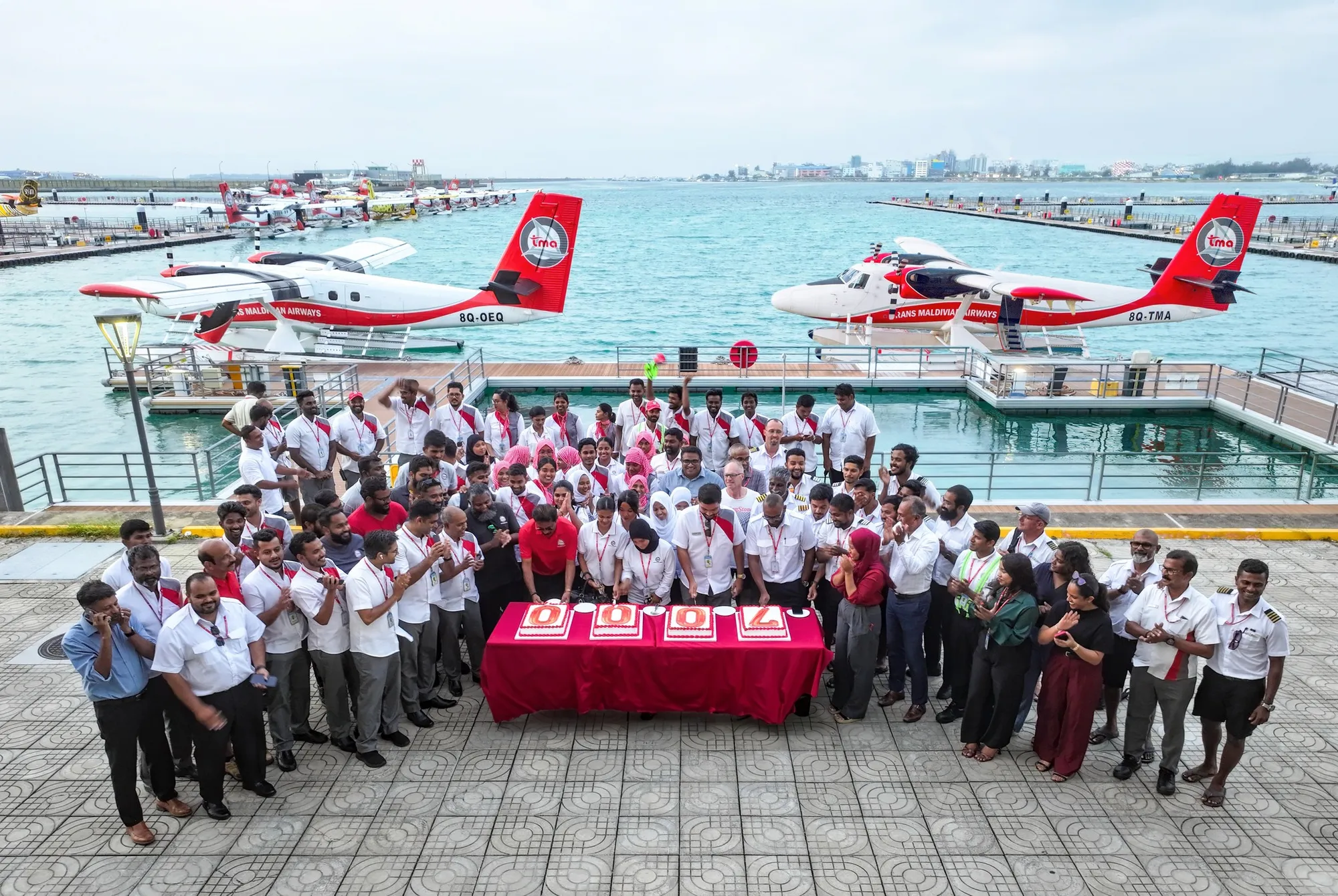 TMA team celebrating transfer of over 7000 passengers in a single day (Photo/TMA)
