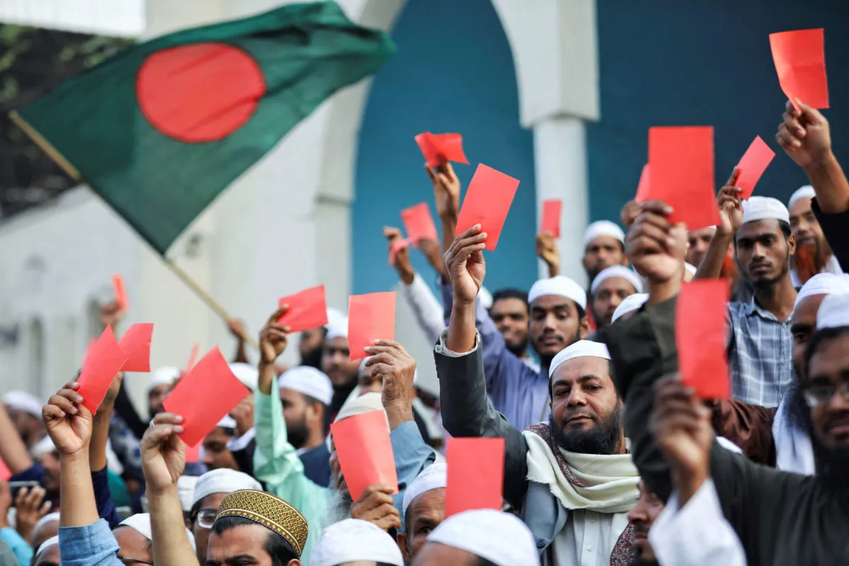 މީގެކުރިން ބަންގާޅުގައި ބޭއްވި އިންތިހާބެއް ބޮއިކޮޓްކުރުމަށް ގޮވާލަނީ... ފޮޓޯ: ޕީބީއެސް