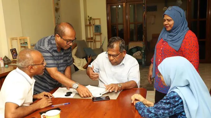 Speaker Nasheed's parents signing for The Democrats--